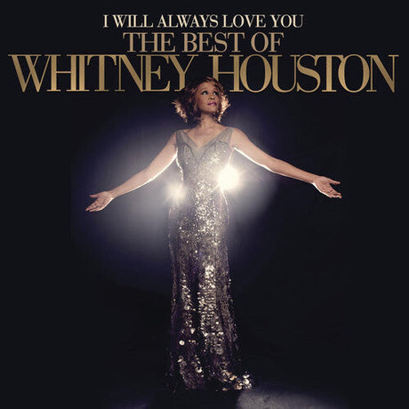 Album cover for 'I Will Always Love You: The Best Of Whitney Houston' featuring Whitney in a sparkling gown