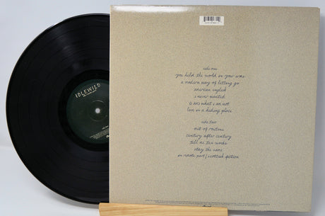 Back cover and vinyl record of Idlewild's The Remote Part LP showing tracklist