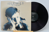 Front cover and vinyl of Idlewild The Remote Part featuring iconic album art