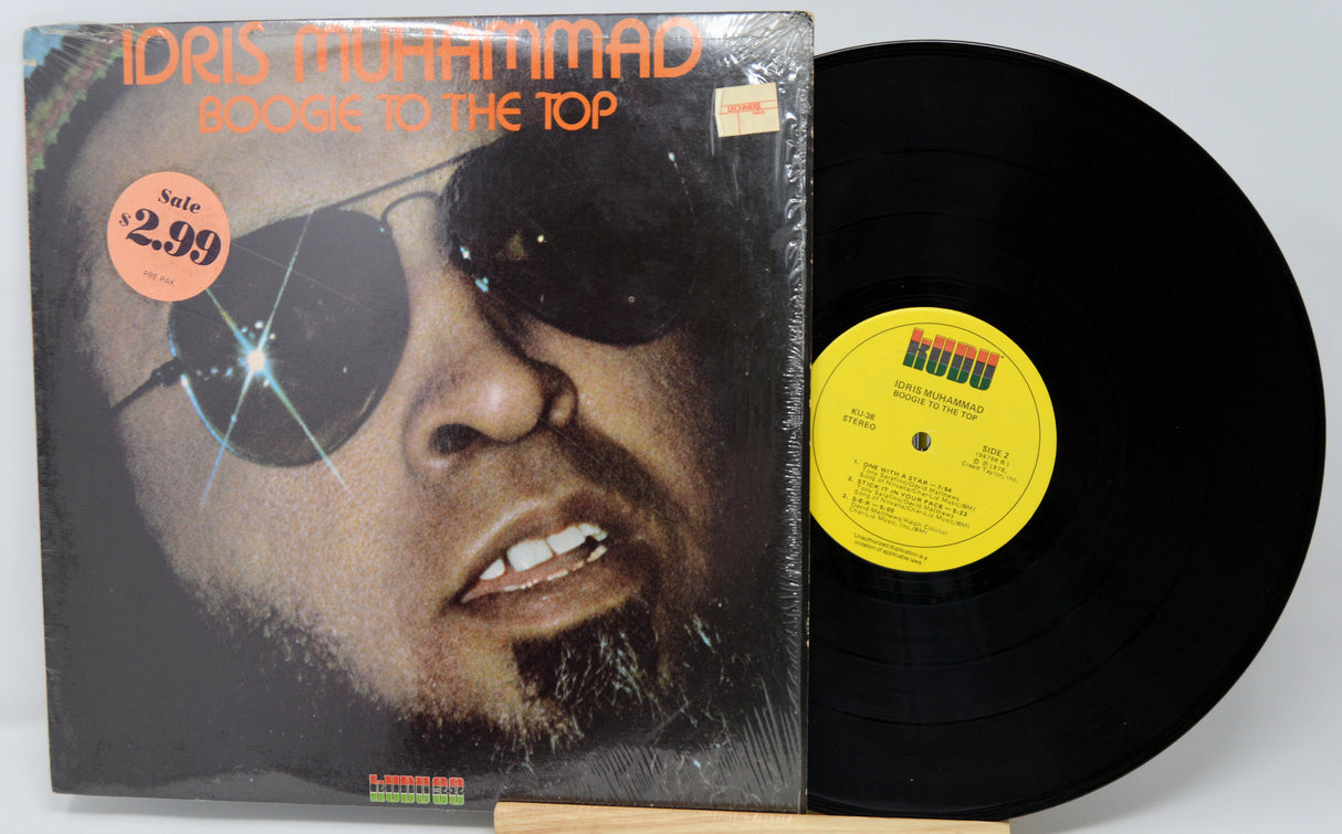 Vinyl record with a cover featuring a person with a eyepatch on a white background