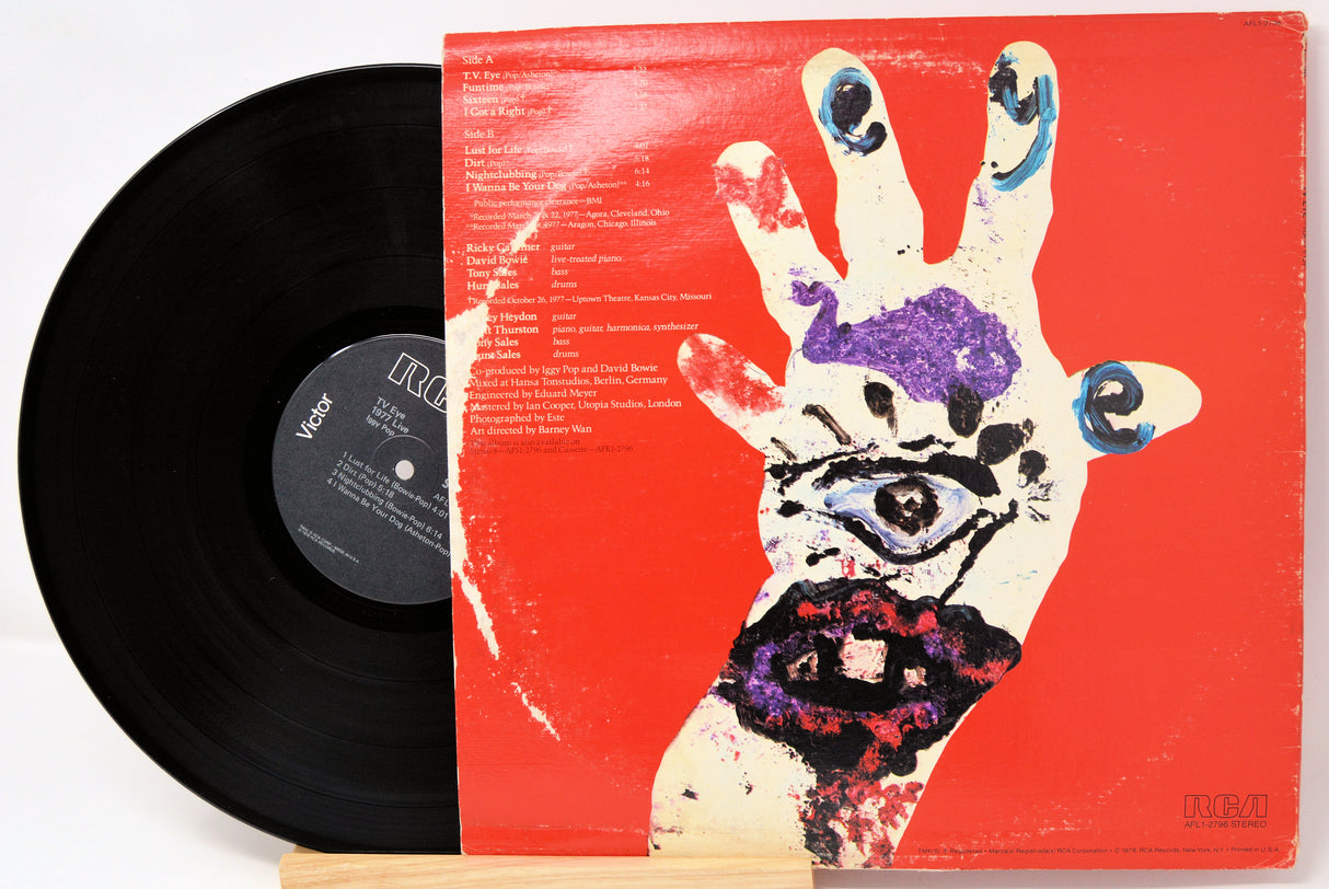Vinyl record with a colorful hand design on the cover