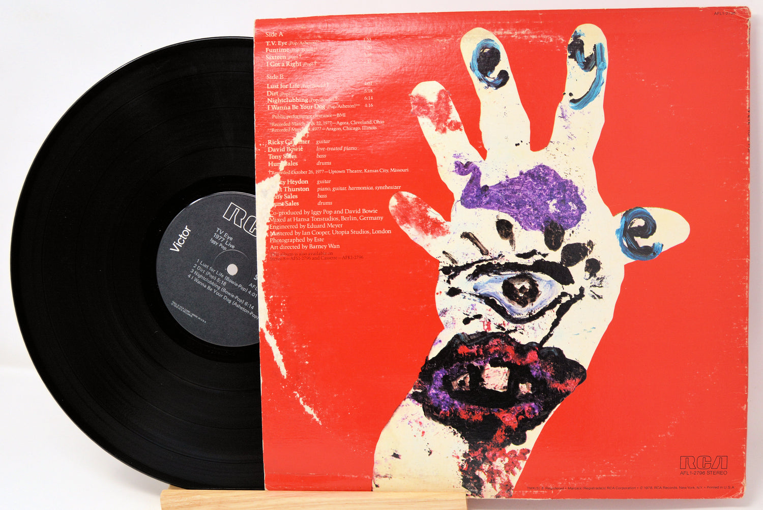 Vinyl record with a colorful hand design on the cover