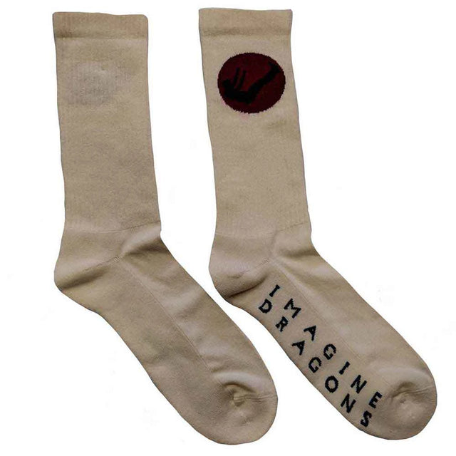 Beige socks with a red circle and black symbol, and 'Imagine Dragons' text on the bottom of the foot.