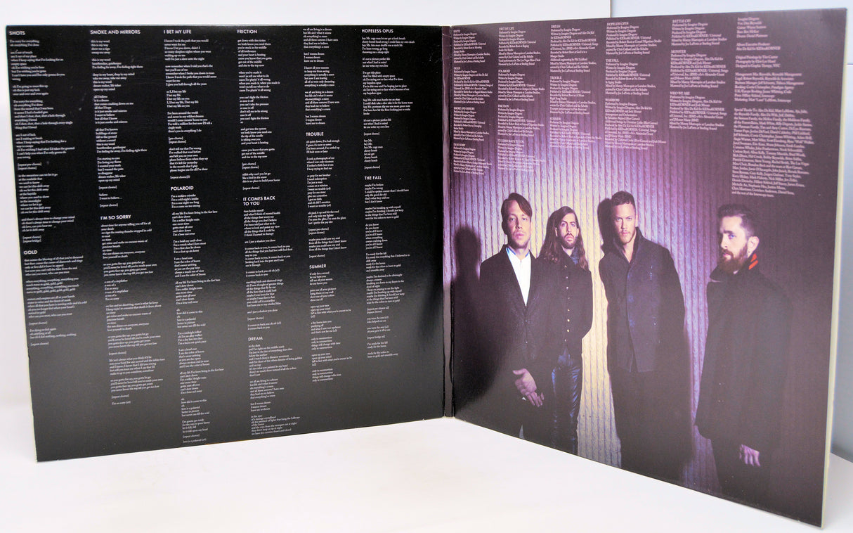 Vinyl record with cover featuring a black and white portrait and album title.