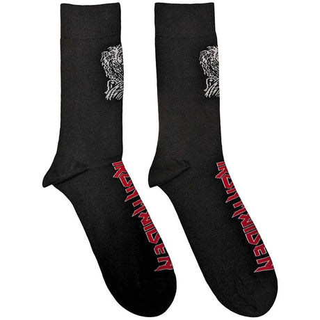 Black socks with red and white text and graphics on a white background