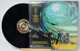 Vinyl record with its cover featuring a cosmic design and characters around a campfire.