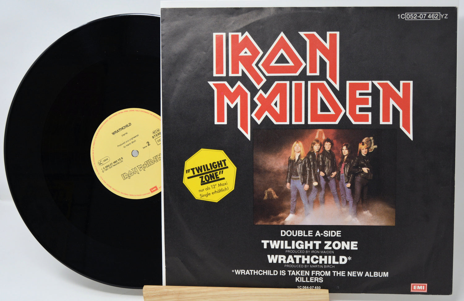 Vinyl record with Iron Maiden album cover featuring band members and album title.