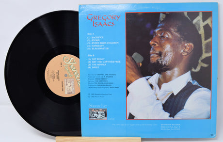 Vinyl record with blue cover featuring a portrait of a man and album details.