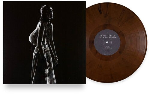 Vinyl record with a black and white image of a person on the cover