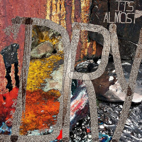 It's Almost Dry album cover featuring gritty urban textures, bold colors, and stylized large text