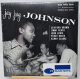 A vintage Blue Note 75 Jazz Series LP record cover for 'Jay Jay Johnson', featuring a black-and-white photo of jazz musicians and the text 'Blue Note 5028'. A white and blue '75 Blue Note' sticker is visible at the bottom.