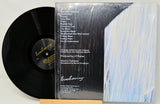 Back cover of Jack Johnson's Brushfire Fairytales 20th anniversary vinyl LP with tracklist and credits