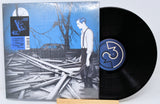 Jack White Fear of the Dawn vinyl record with illustrated cover art showing a man in a blue scene