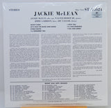 The back cover of a vinyl record sleeve for Jackie McLean's album 'What's New' on Blue Note Records, showing track listings and text on a white background.