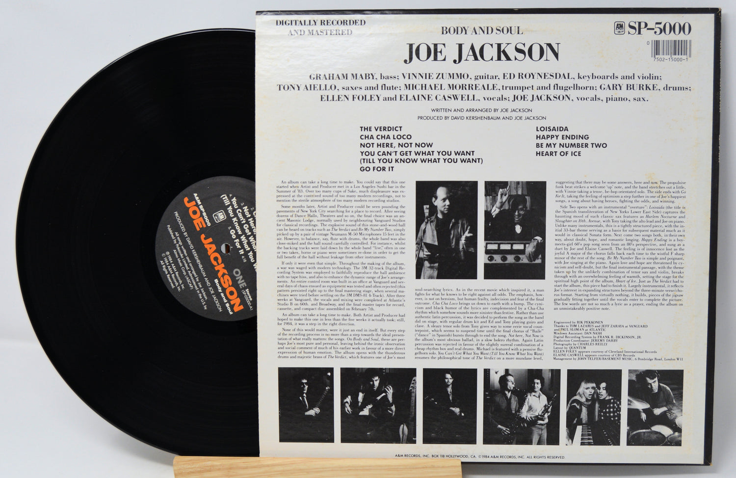 Vinyl record with its cover featuring Joe Jackson on a light gray background