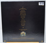 Back cover of a vinyl record with text and album artwork on a white background