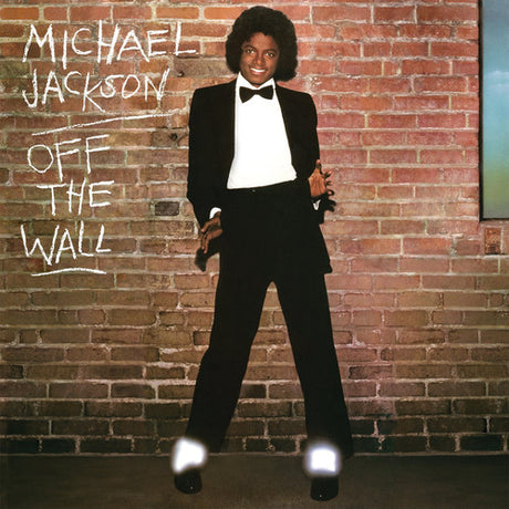 Album cover of 'Off The Wall' by Michael Jackson with a brick wall background.