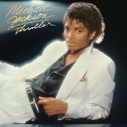 Jackson, Michael - Thriller Album cover of 'Thriller' by Michael Jackson with the artist holding a gun.
