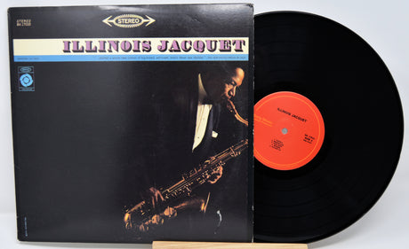 Vinyl record and cover featuring Illinois Jacquet on a white background