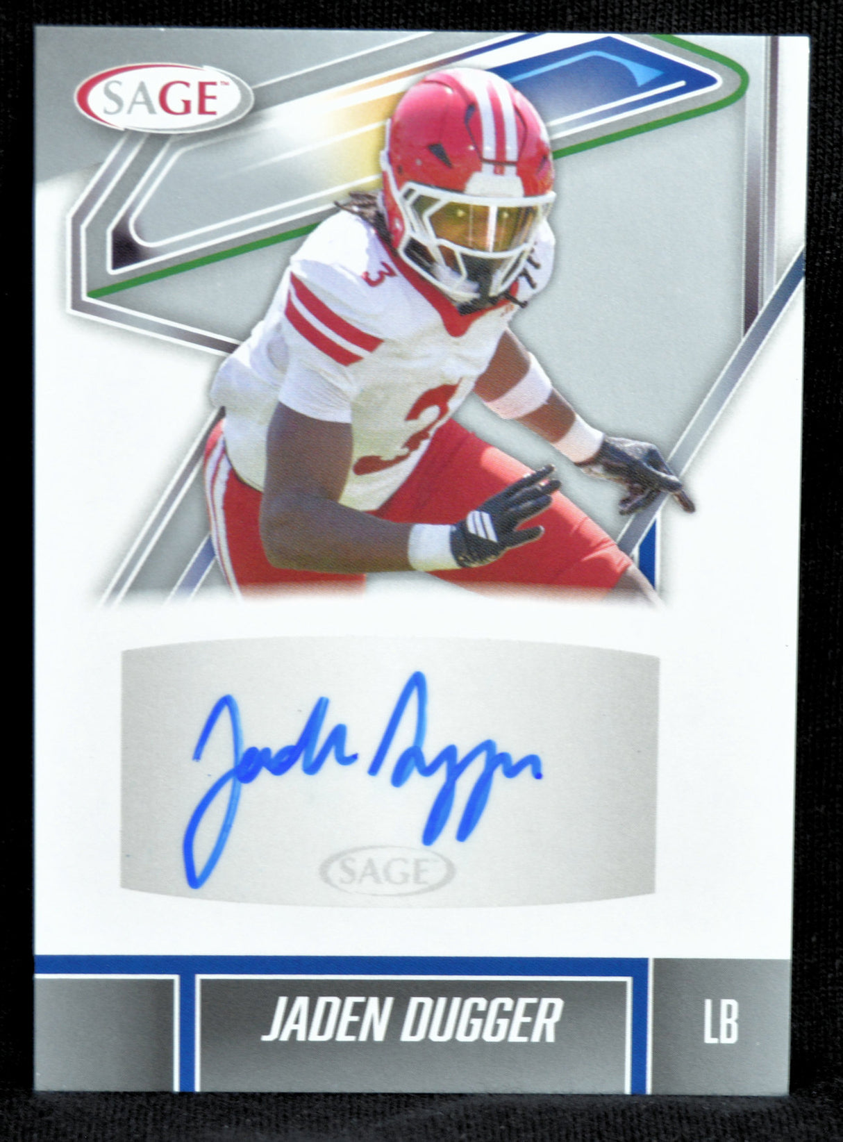Football trading card of Jaden Dugger with autograph, wearing a red and white uniform.
