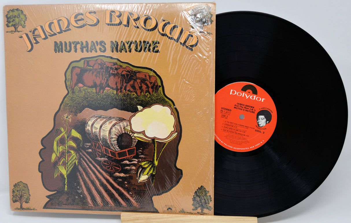 Vinyl record with cover featuring James Brown 'Mutha's Nature' on a white background