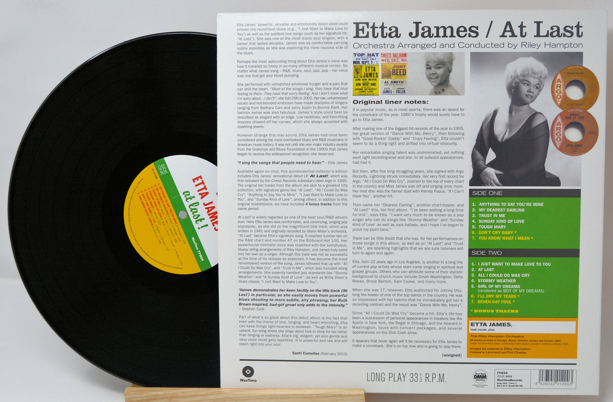 Vinyl record with its cover featuring Etta James' 'At Last'.