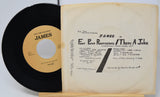 Vinyl record with a yellow label and its cover displaying text.