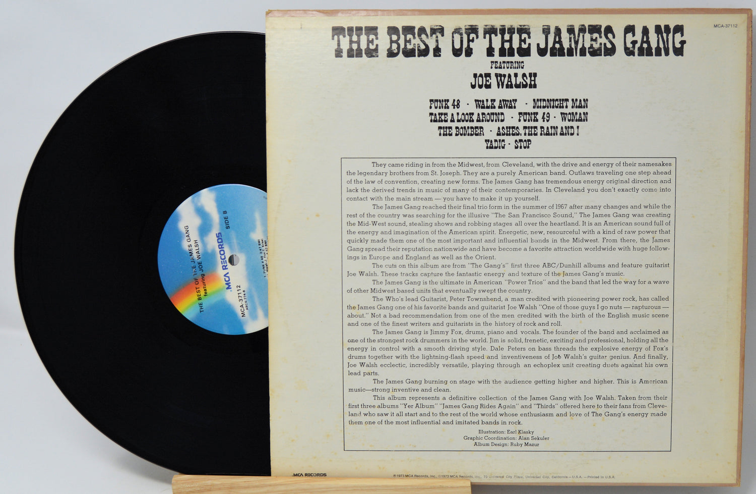 Vinyl record with cover displaying 'The Best of the James Gang' by Joe Walsh on a light gray background.