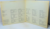 Open book with text on a white background