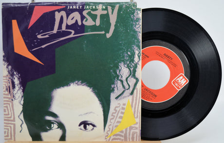 Vinyl record with cover featuring Janet Jackson's 'Nasty' single