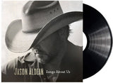 Vinyl record with a cover featuring a person wearing a cowboy hat and the title 'Songs About Us' by Jason Aldean.