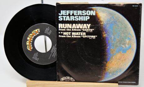 Vinyl record and its cover featuring Jefferson Starship on a white background