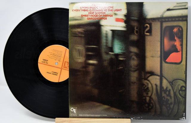 Back cover and vinyl record of Jeremy Steig's Firefly album with subway artwork