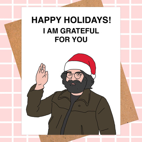 Holiday card with a cartoon character wearing a Santa hat and text on a pink grid background