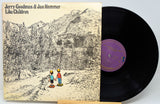Vinyl record album 'Like Children' by Jerry Goodman & Jan Hammer, showing the illustrated cover sleeve and a black LP partially pulled out, with a purple center label.