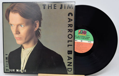 Vinyl record and cover of 'The Jim Carroll Band' with a portrait on the cover
