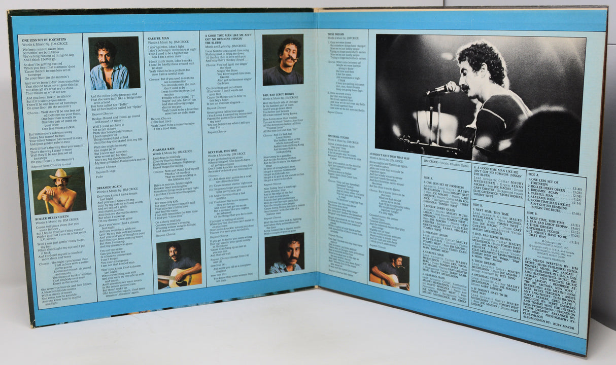 Vinyl record sleeve with black and white photos and text on a white background