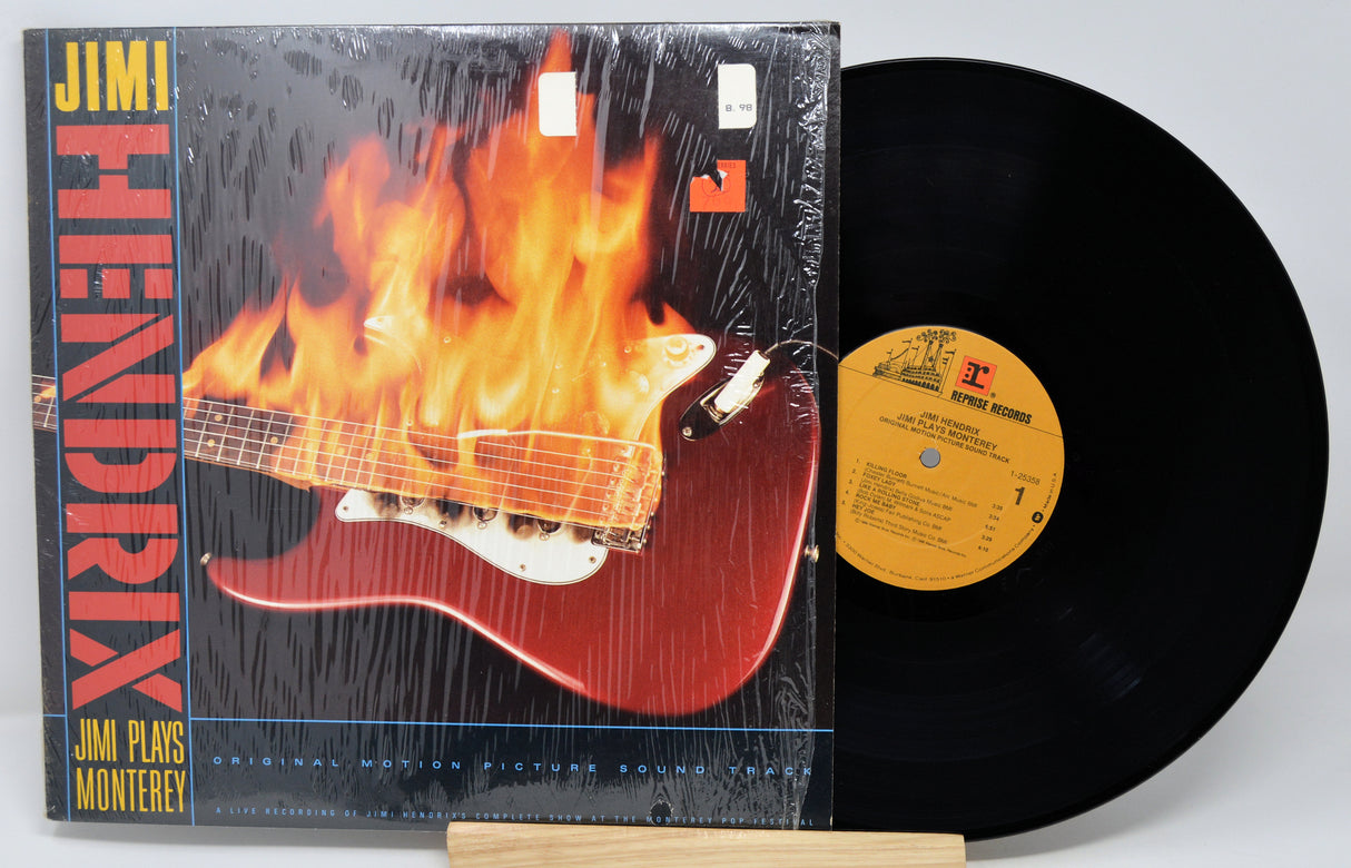 Vinyl record with a flaming guitar design on the cover