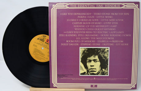 Vinyl record with a colorful cover featuring a group of women and a lipstick.