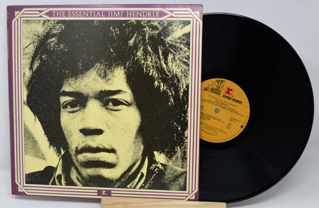Vinyl record with a colorful cover featuring four band members.