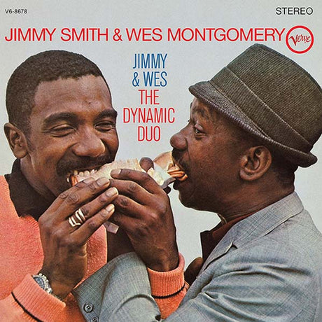 Album cover of Jimmy Smith and Wes Montgomery sharing a sandwich, The Dynamic Duo