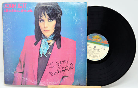 Vinyl record with cover featuring a person, on a white background