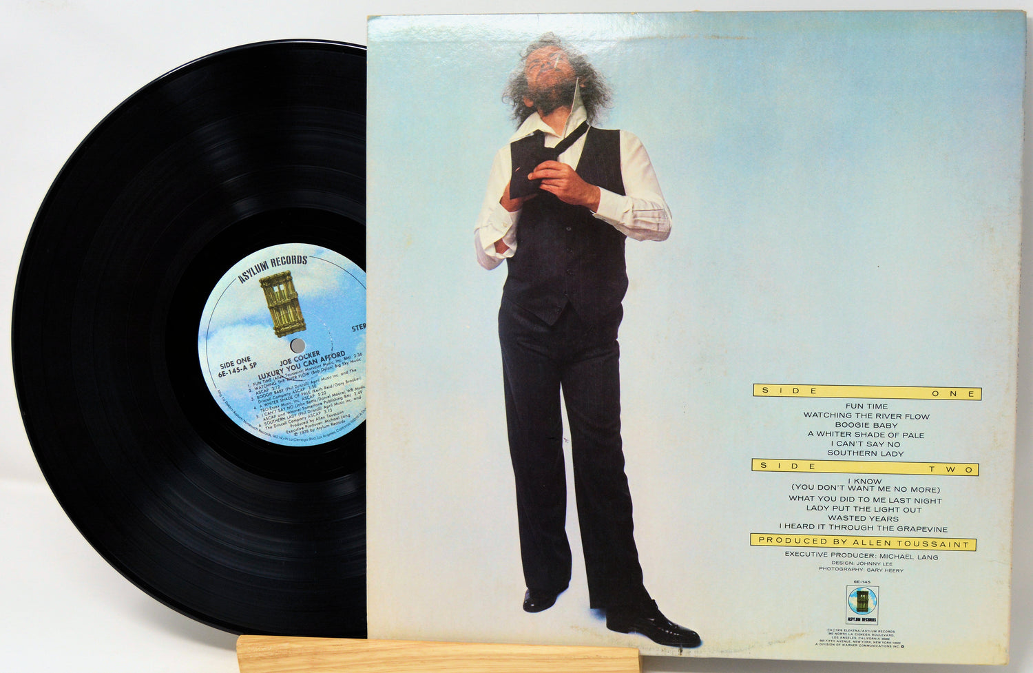 Vinyl record with a person on the cover and visible text