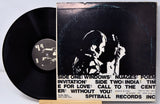 Back cover and record of Joe Diorio Solo Guitar vinyl LP showing track list and artist silhouette