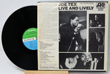 Vinyl record with 'Joe Tex Live and Lively' album cover on a white background