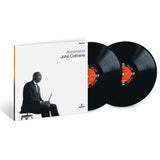 Vinyl record set with 'Ascension' by John Coltrane on a white background