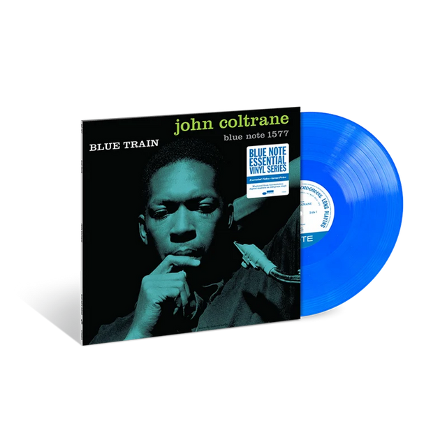 Blue Train vinyl record album by John Coltrane, shown with the black-and-teal album cover standing upright and a translucent blue vinyl record partially pulled out, on a light gray background.