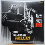 John Coltrane 'Giant Steps' vinyl record album cover, sealed in shrink wrap, with a black-and-white photo of the saxophonist, white title text, and a red/orange Jazz Classics 180g sticker.