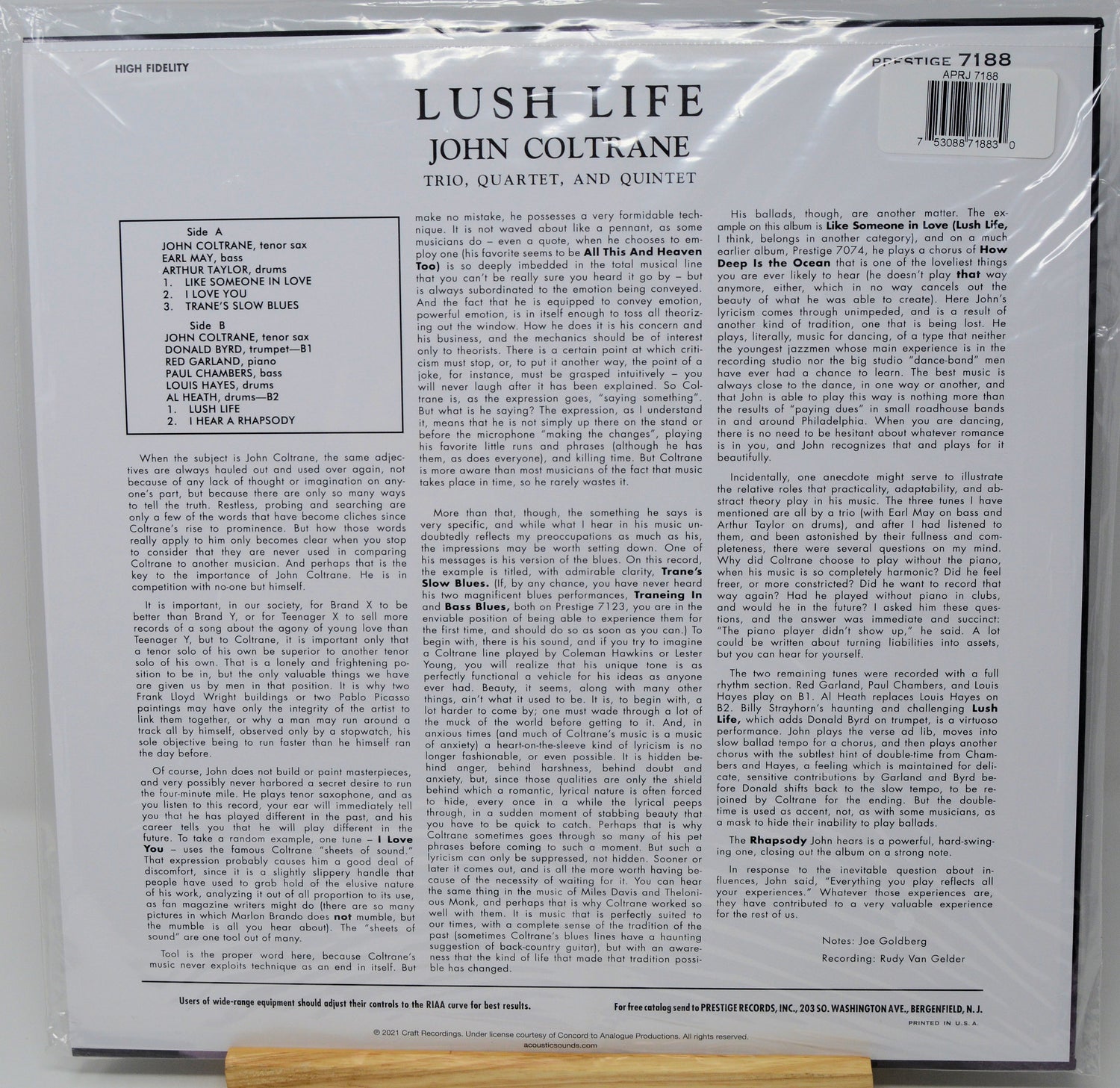 Back cover of a vinyl record sleeve for John Coltrane's 'Lush Life' (Vols. 1-4, and Quintet), sealed in plastic shrink wrap, photographed against a white background.