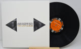 Front cover and vinyl record of John Coltrane Both Directions At Once The Lost Album with title